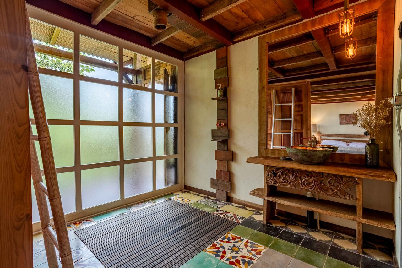 A Handcrafted Residence Immersed in Nature Above the Canopy Ocean View Architectural Home