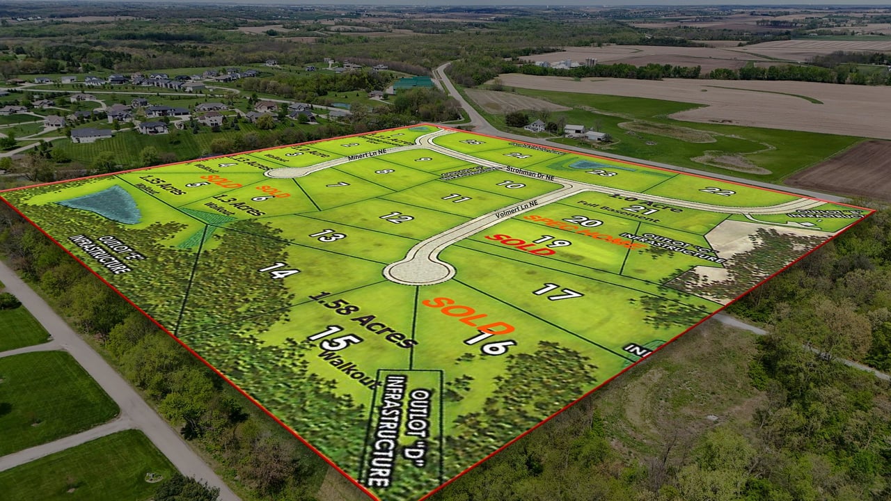 Aerial view of Oak Meadow’s lot plan, with numbered parcels, roads, and sold lots outlined in red.