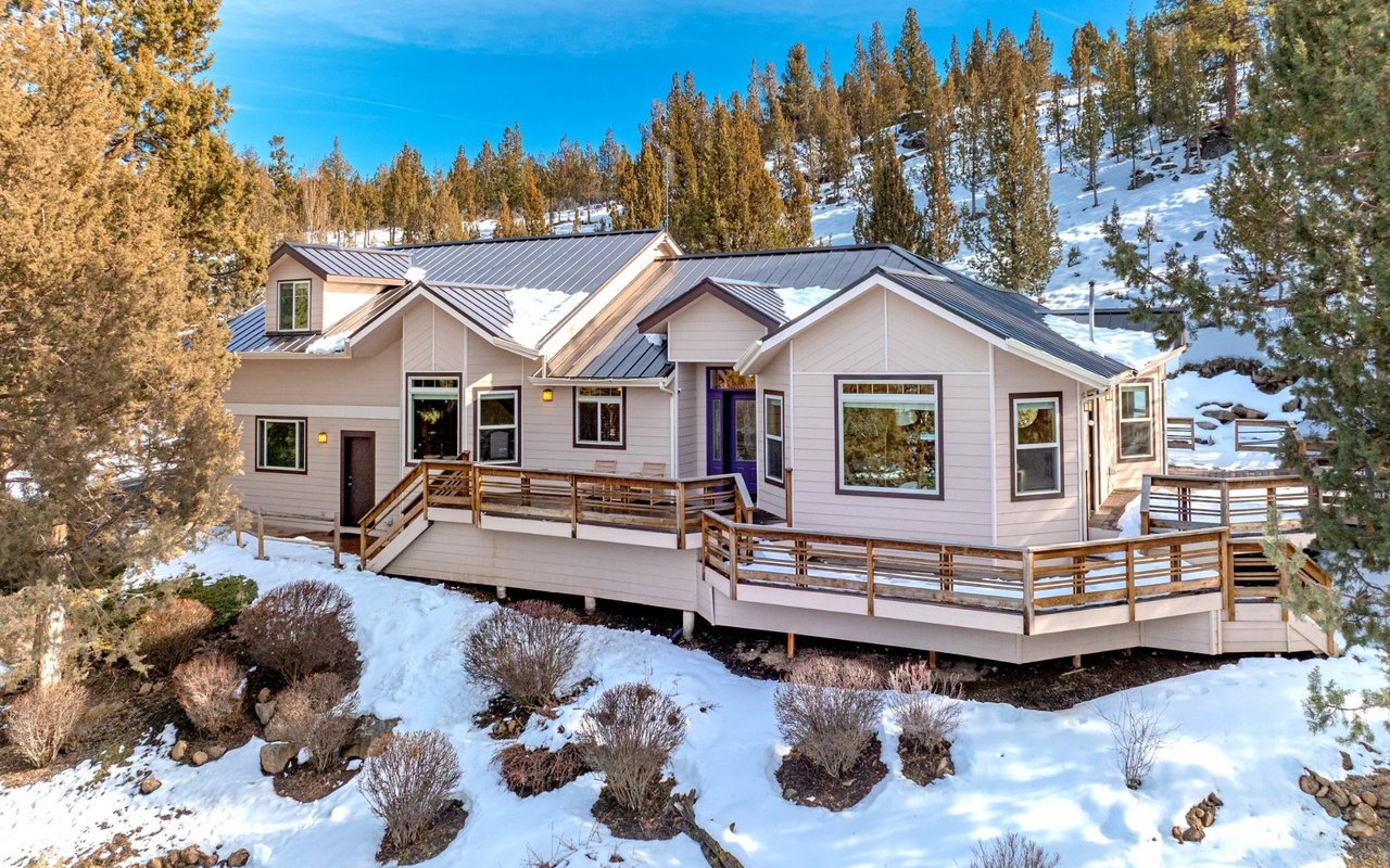 Just Listed: Secluded Retreat with Stunning Views and Spacious Design!