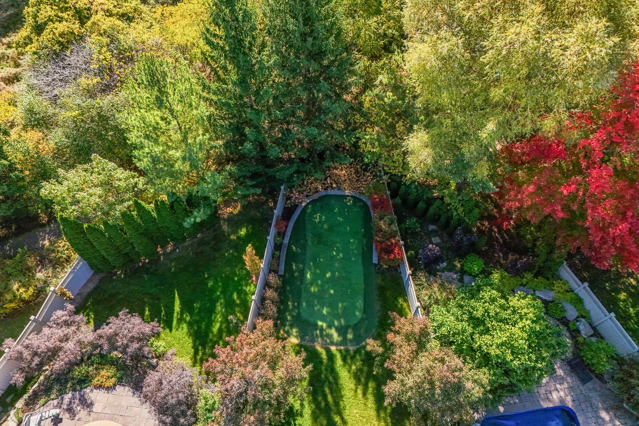 Resort-style yard backing onto lush ravine