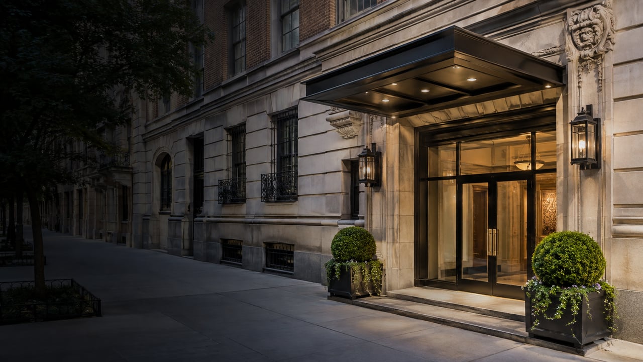 Exterior entrance of a well-maintained New York City condo or co-op building