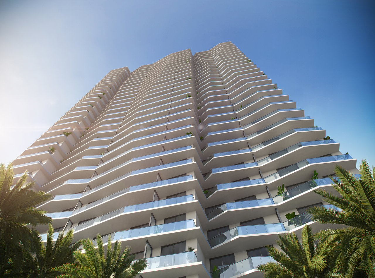 Viceroy Brickell tower with tiered glass balconies and palm trees.