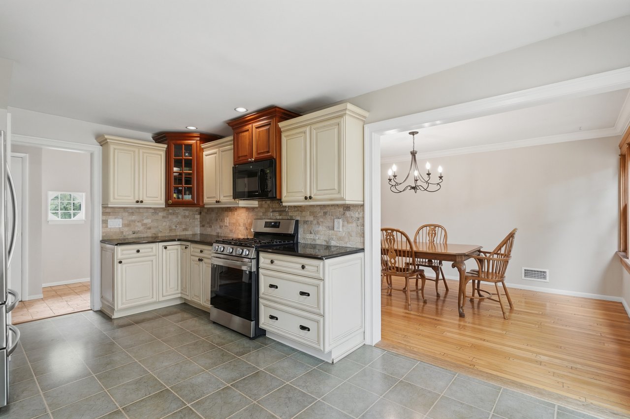 Cooking corner with gas stove-top, oven, pot filler, and built-in microwave