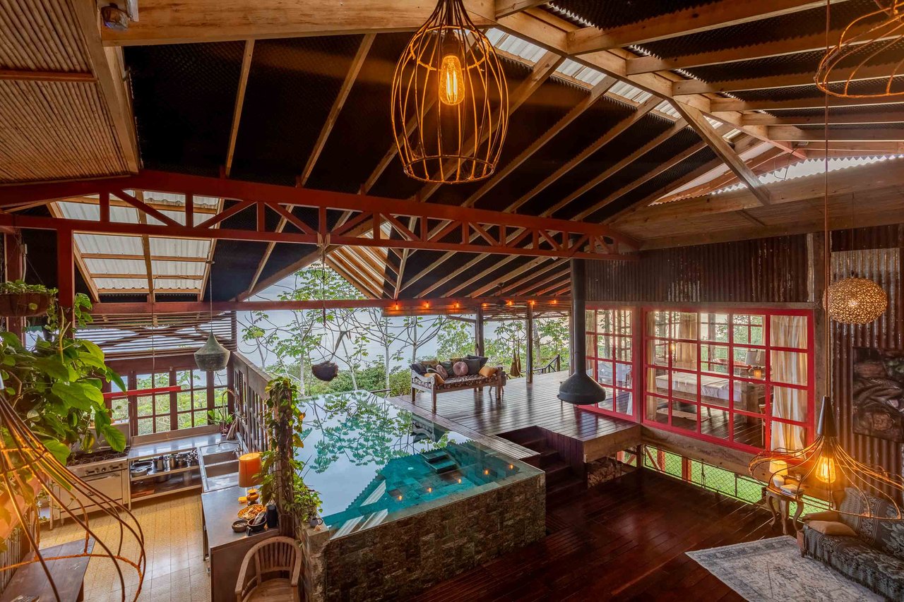 A Handcrafted Residence Immersed in Nature Above the Canopy Ocean View Architectural Home