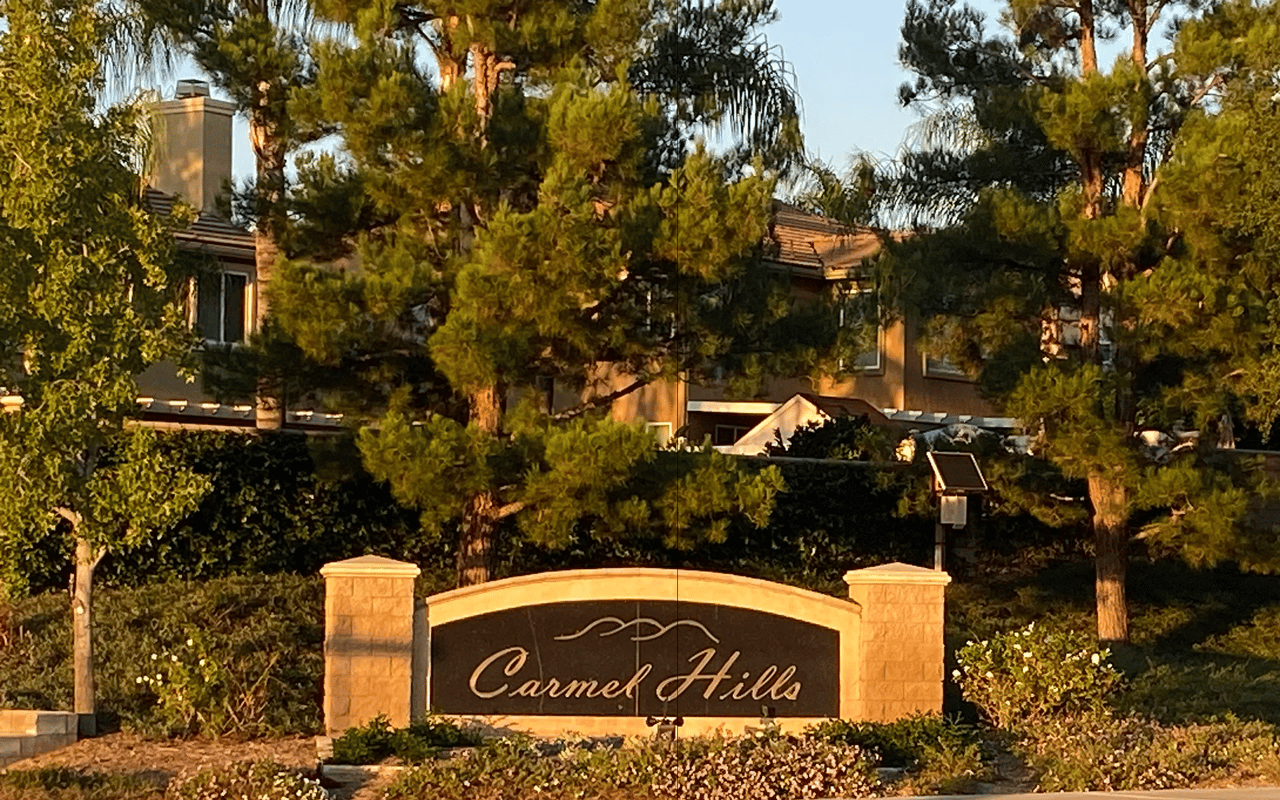 Landscaped monument sign at the entrance to the Carmel Hills neighborhood in Wildomar, CA.