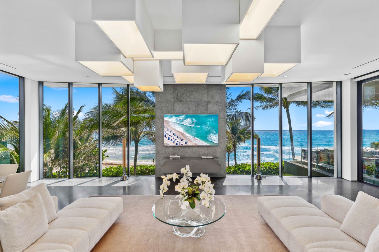 Mansion living room facing the private 120 feet of beachfrontage