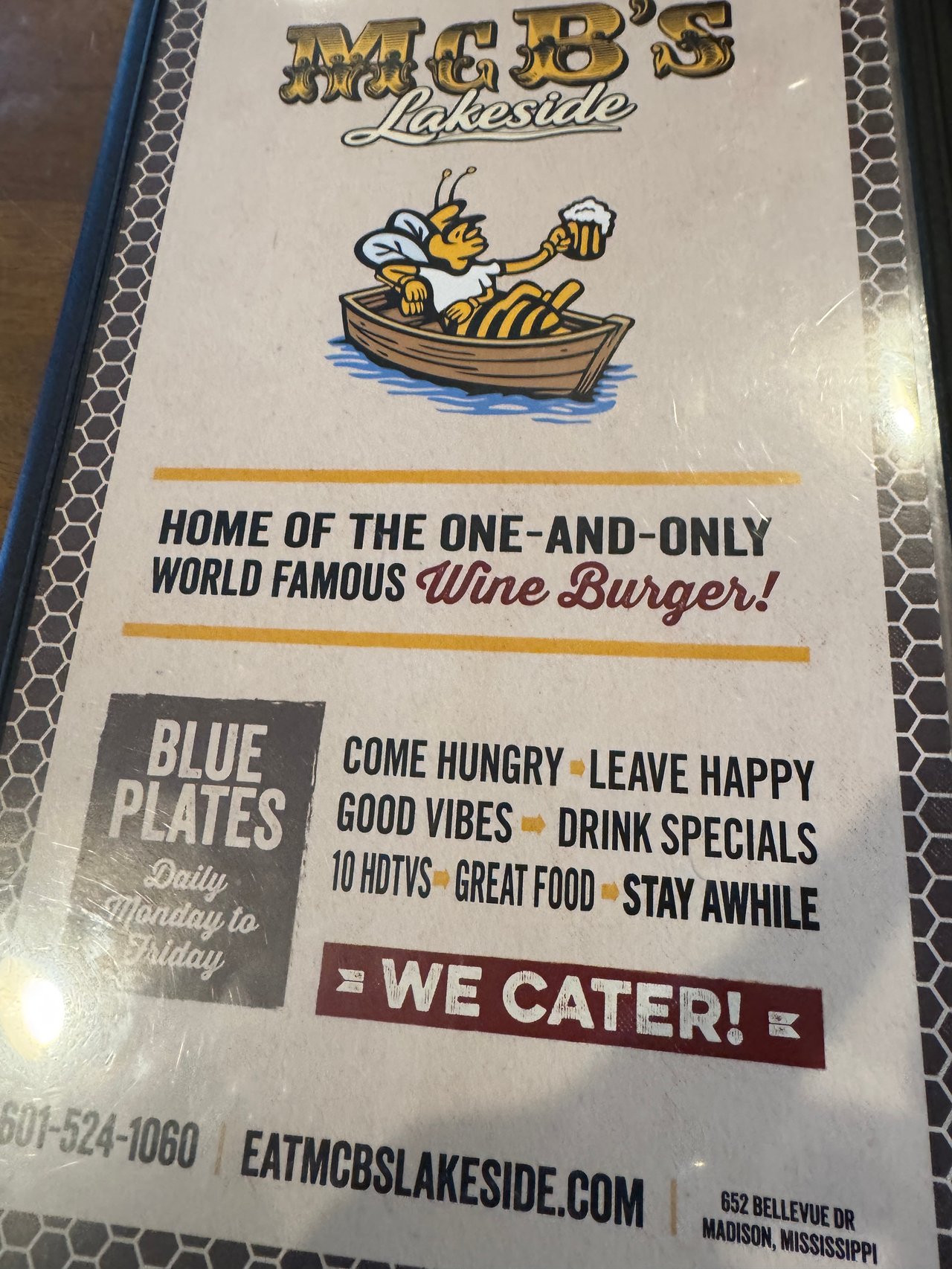 MCB’s Lakeside menu promoting its Wine Burger, daily blue plates, drink specials, and catering.
