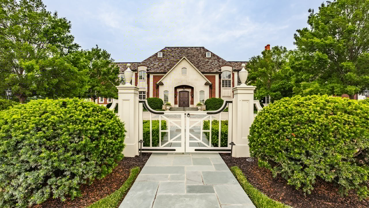 Gated entrance to 10330 Laurel Ridge Lane, the highest-priced single-family home ever sold in Carmel, brokered with high discretion by Jason O'Neil.