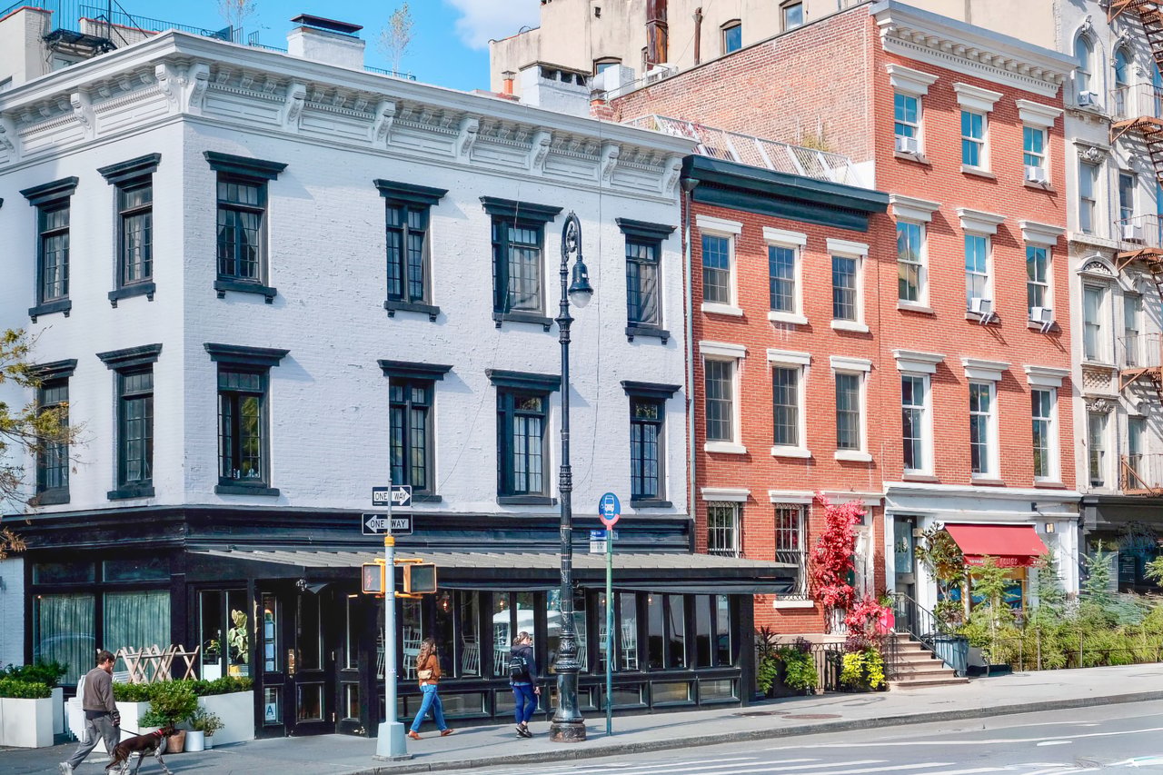 Historic brownstones, townhouses, and multifamily homes along DeKalb Avenue in Bedford-Stuyvesant, Brooklyn.