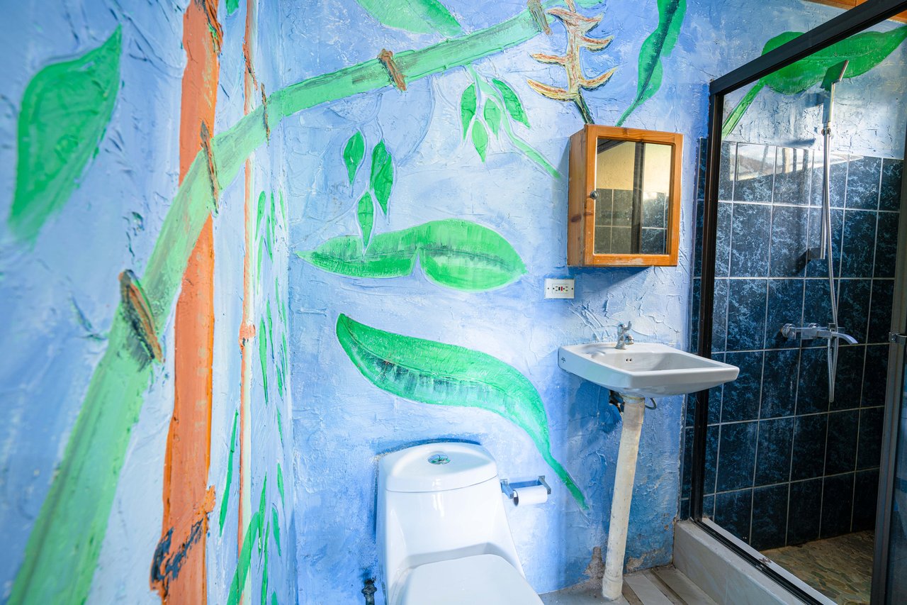 0.15 ACRES – 2 Bedroom Artistic River Home In The Rainforest!!!