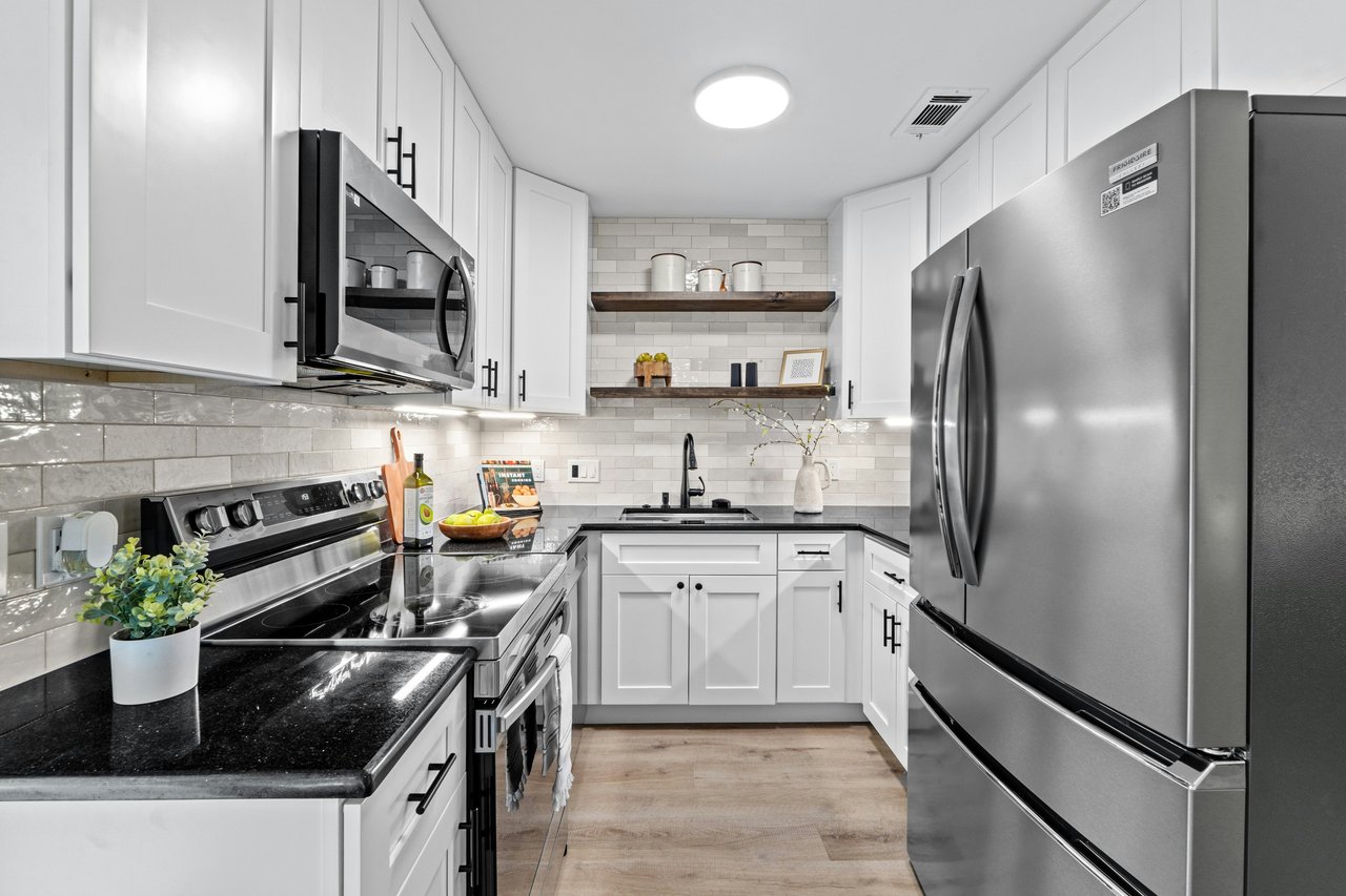 Bright & Chic Corner Lot Home in Coppertree Condos