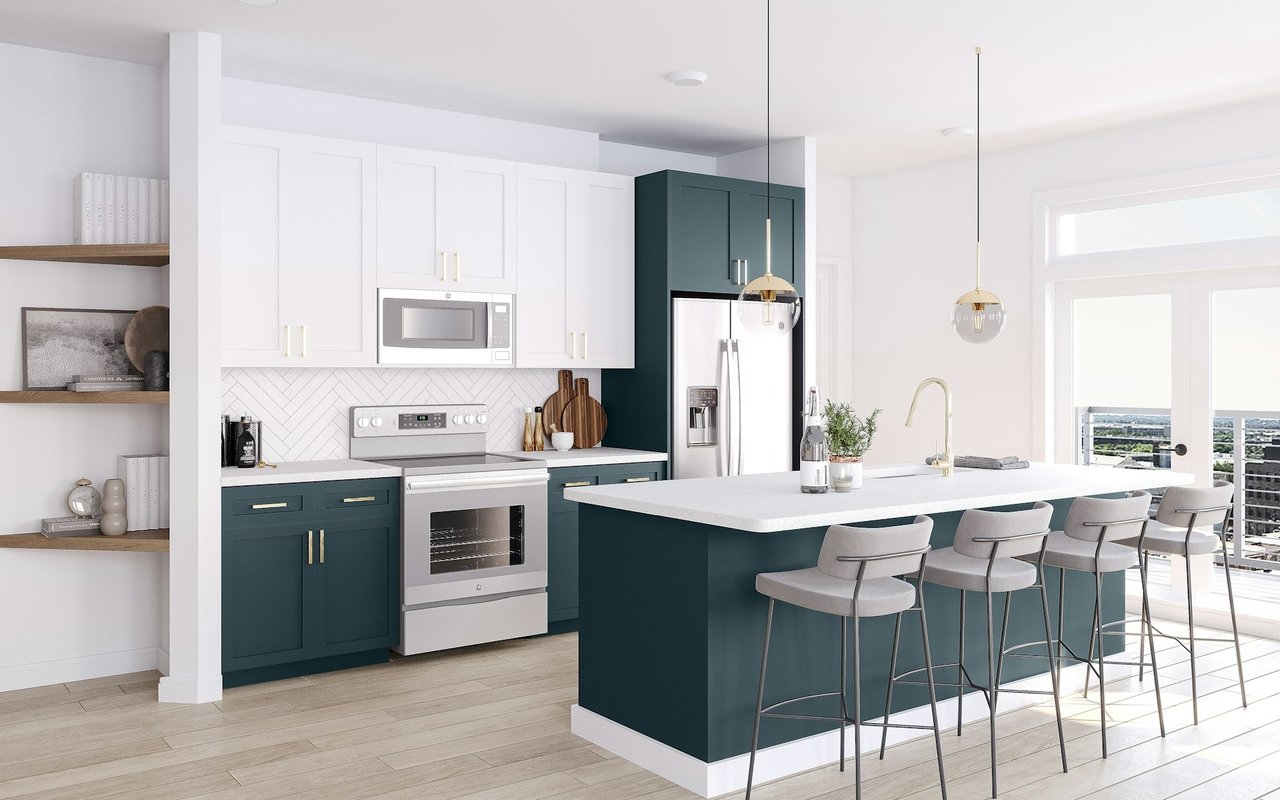 Bright kitchen with teal cabinets and island, stainless steel appliances, and bar stools by glass doors.