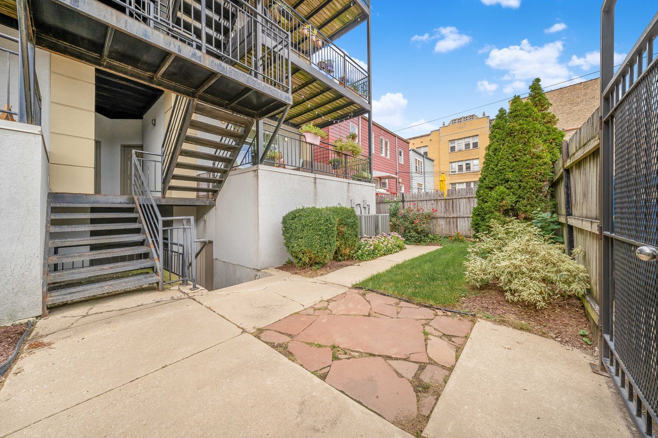 Back yard and rear entrance of the building