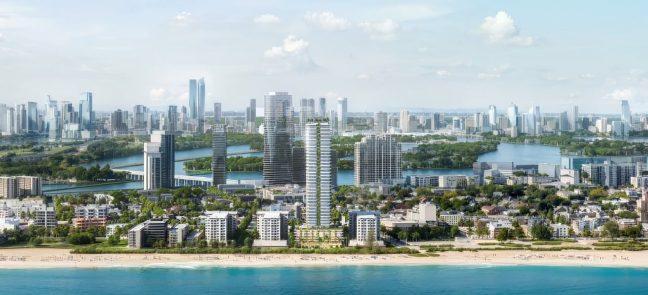 High-rise condo tower beside a sandy beach, with bay bridges and a distant city skyline.