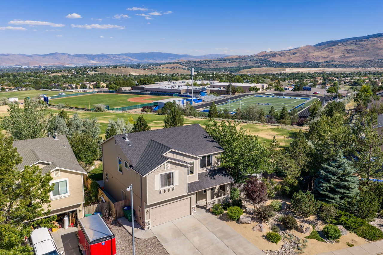 Beautifully remodeled 4-bed home in NW Reno with sweeping mountain views, no HOA, and one of the largest lots in the neighborhood. Updated kitchen, hardwood floors, spa-like primary bath, and a versatile loft. Schedule your showing today.