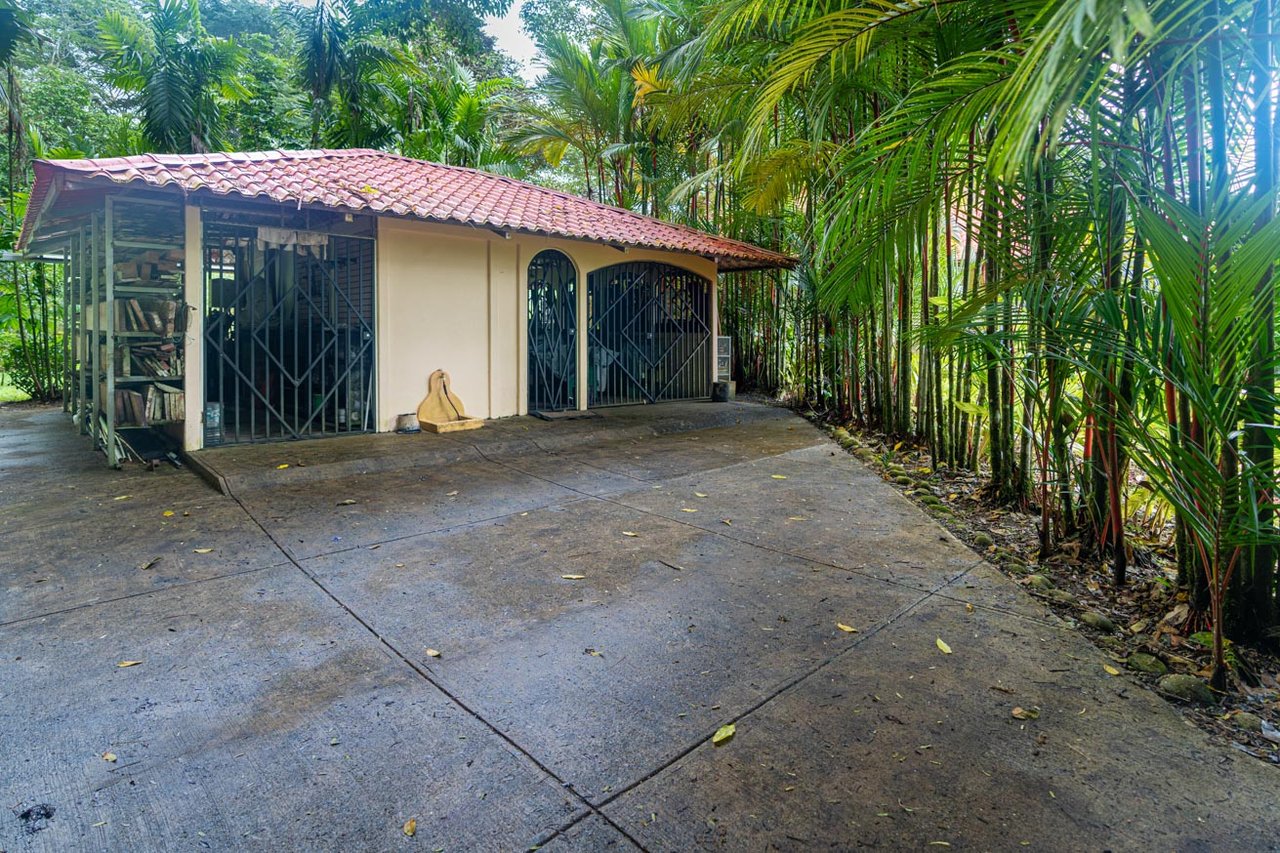 Ocean, jungle & mountain views on a meticulously landscaped 3-home family compound