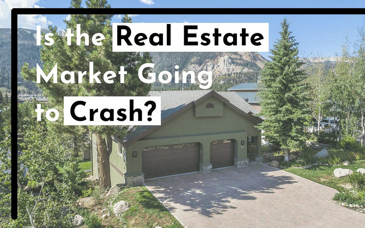 Is the Real Estate Market Going to Crash? A house sits beneath the headline, with mountains in the background.