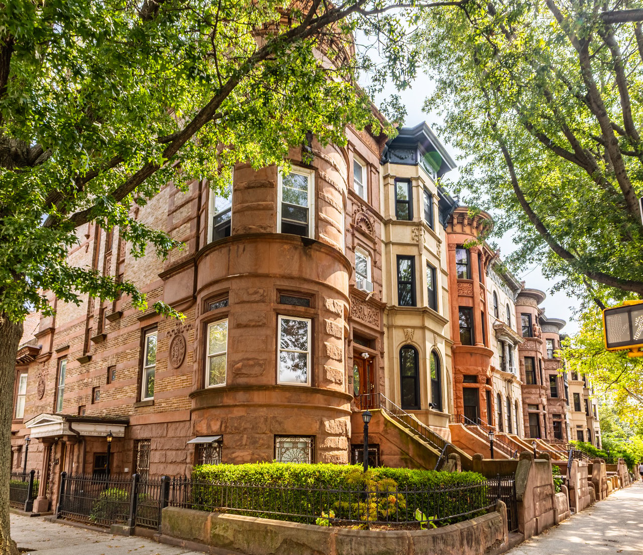 Prospect Avenue in Windsor Terrace, Brooklyn, featuring historic brick townhouses, prewar residential buildings, traditional masonry architecture, and neighborhood landmarks near Greenwood Avenue and the Seeley Street bridge.