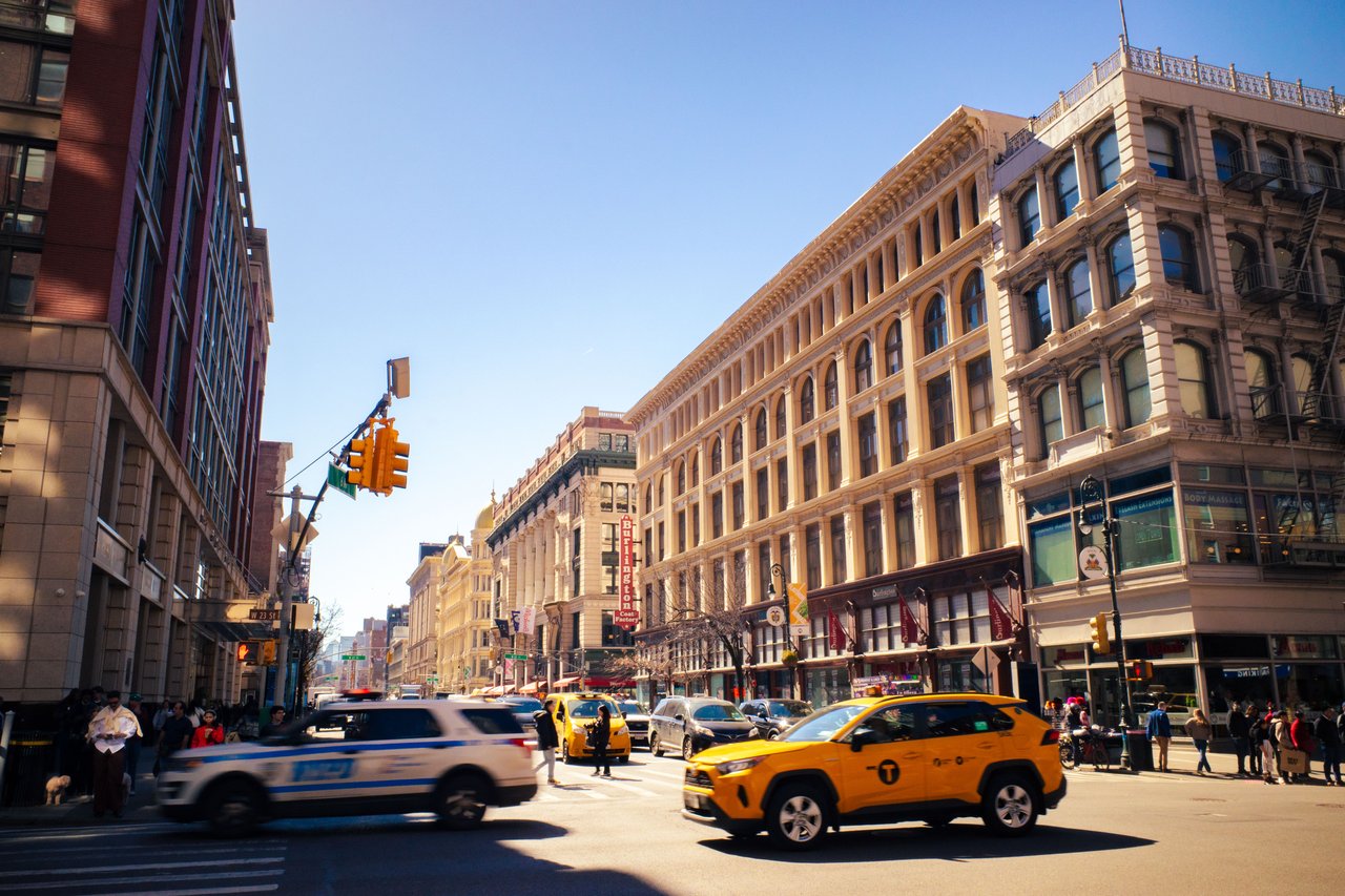 Explore West Houston Street and the architectural history of SoHo, including the meaning of the neighborhood's name, nineteenth-century cast-iron buildings, historic manufacturing lofts, artists' conversions, and the preservation of Manhattan's SoHo-Cast Iron Historic District.
