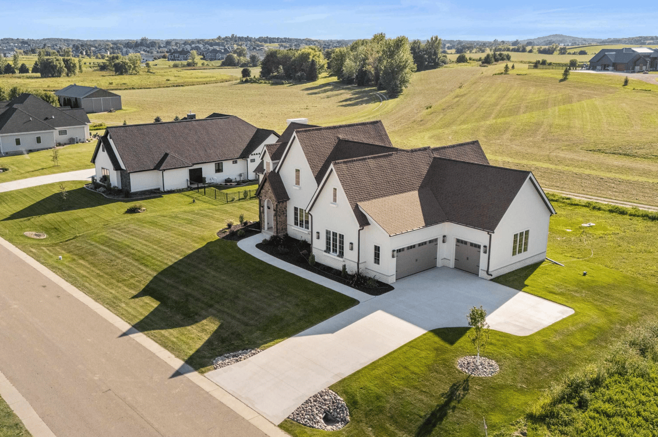 An aerial view of a custom luxury estate in Sun Prairie, Wisconsin, representing the high-end real estate market and luxury neighborhoods found throughout the Greater Madison area and Dane County.