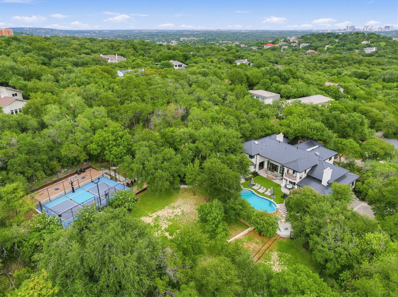 THE CANOPY 3.3 private acres in the heart of West Lake Hills.