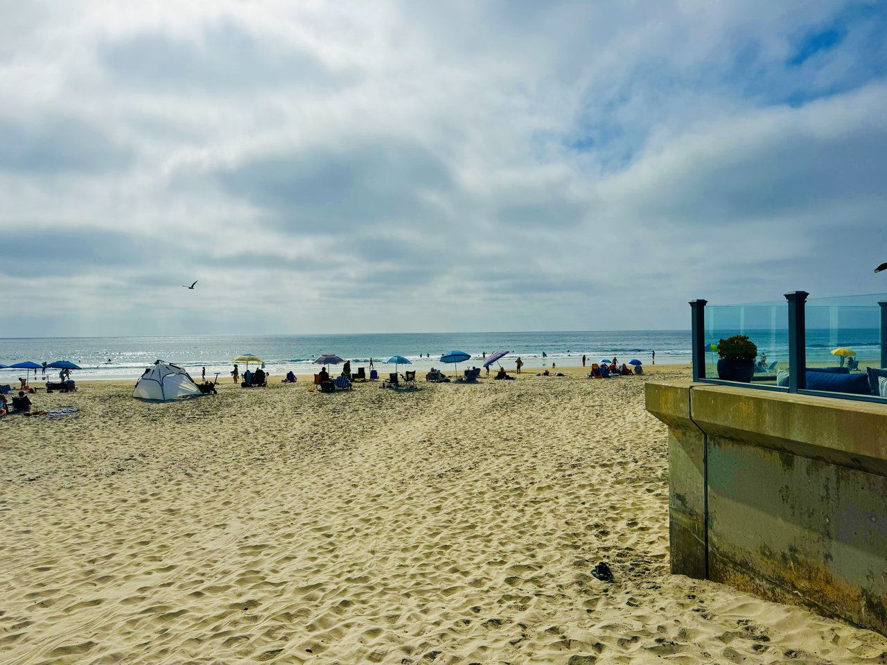 View of the pristine beach-crystal-clear water and clear blue sky in del-mar-ca