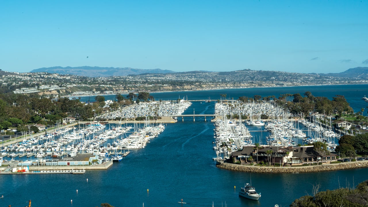 Dana Point Harbor, CA – luxury coastal community with oceanfront homes and yachts