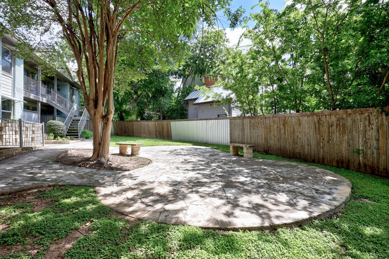 Top-Floor Condo Retreat in Gated Ivy Condos | Private Balcony + Tree-Filled Views