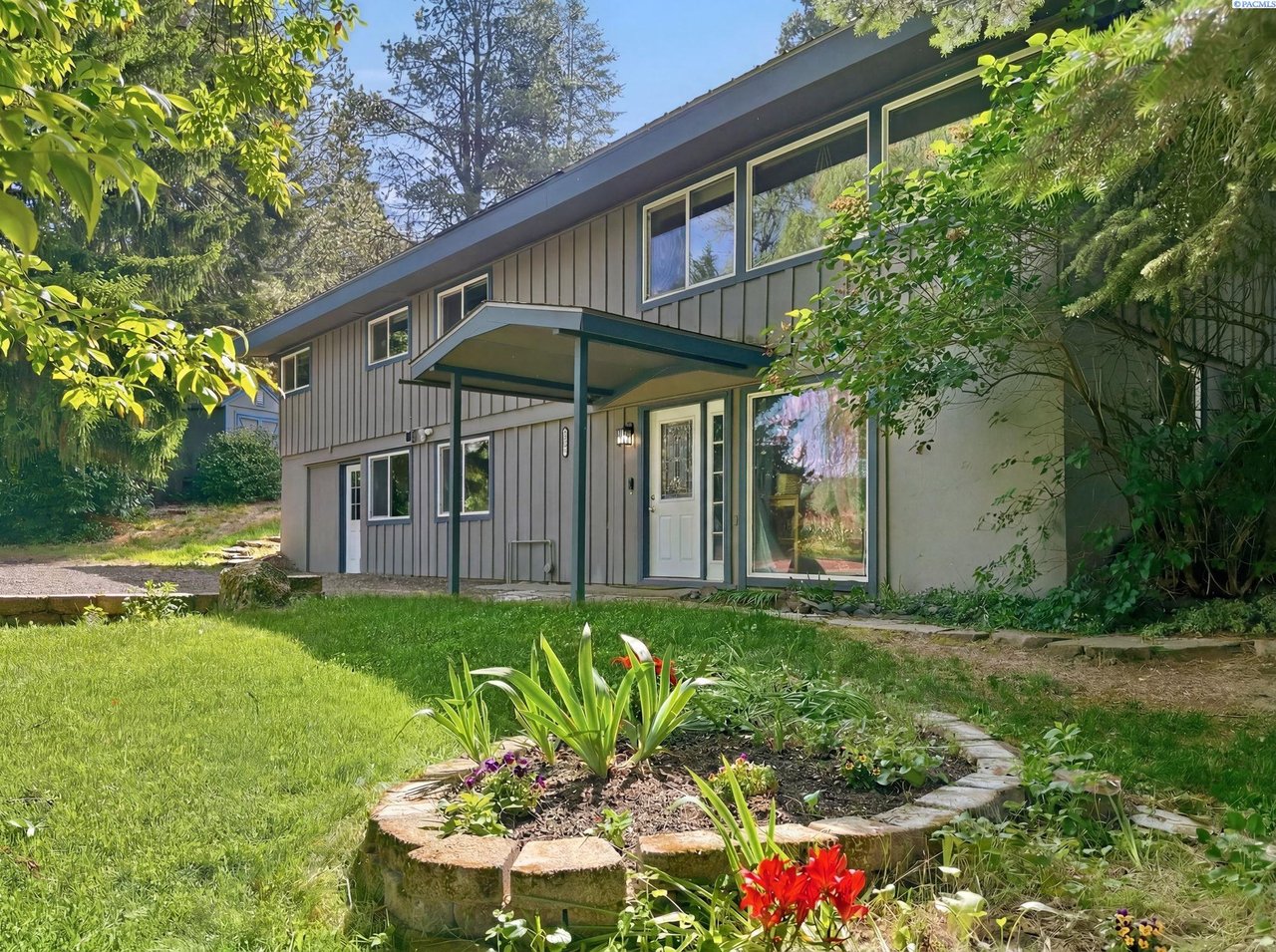 Blog header for 1620 SW Baldwin Drive in Pullman WA, a 4-bedroom home on a wooded 0.78-acre lot in the Evergreen Community.