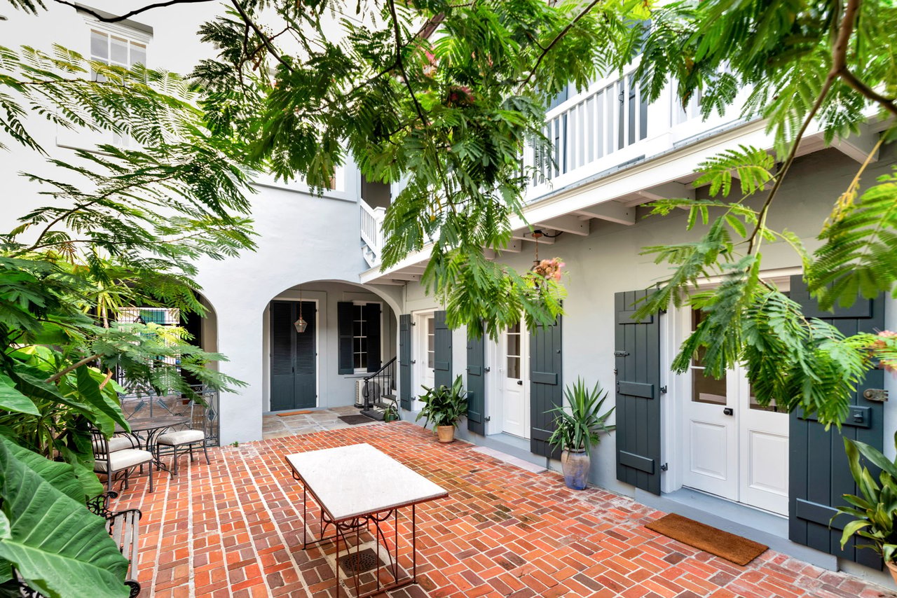 two-story dependency and courtyard
