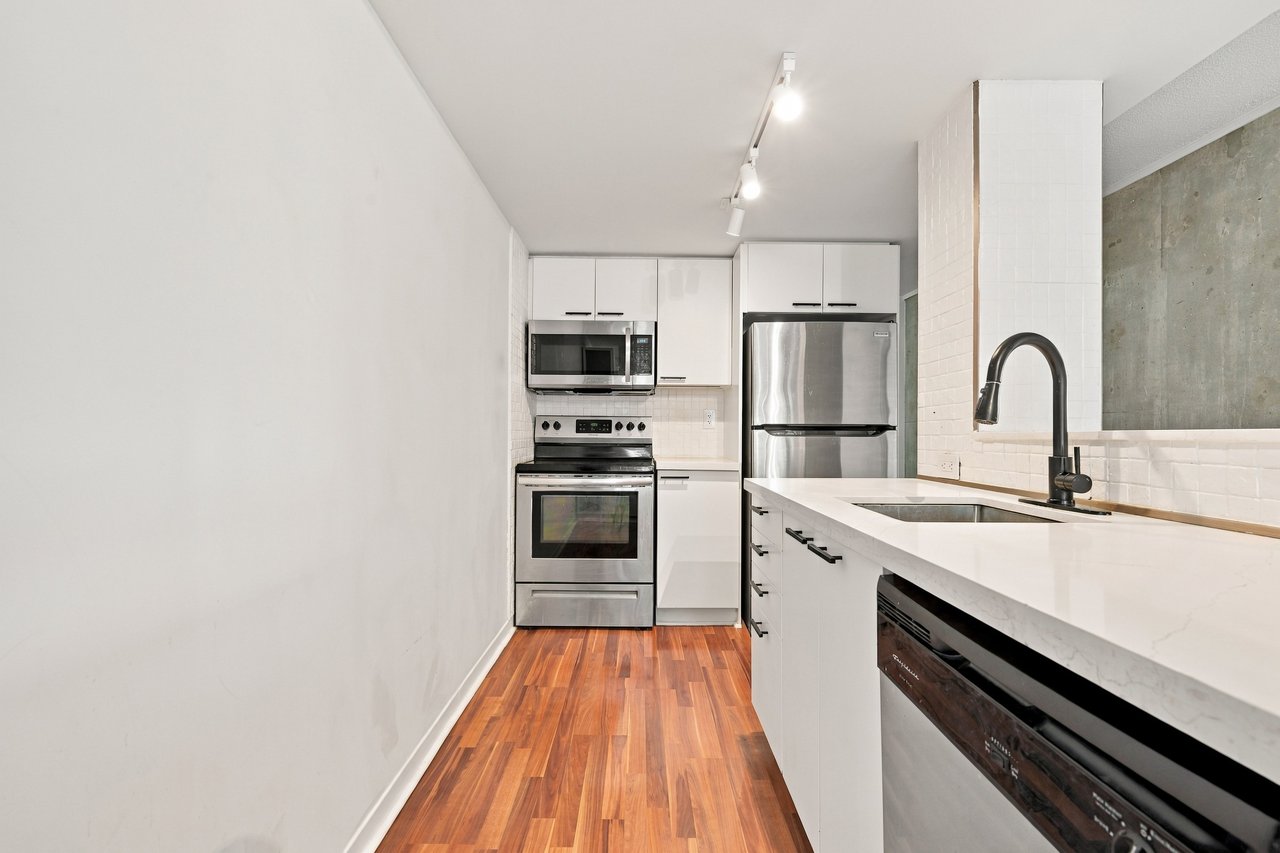 Immaculate 2 Bedroom Corner Unit