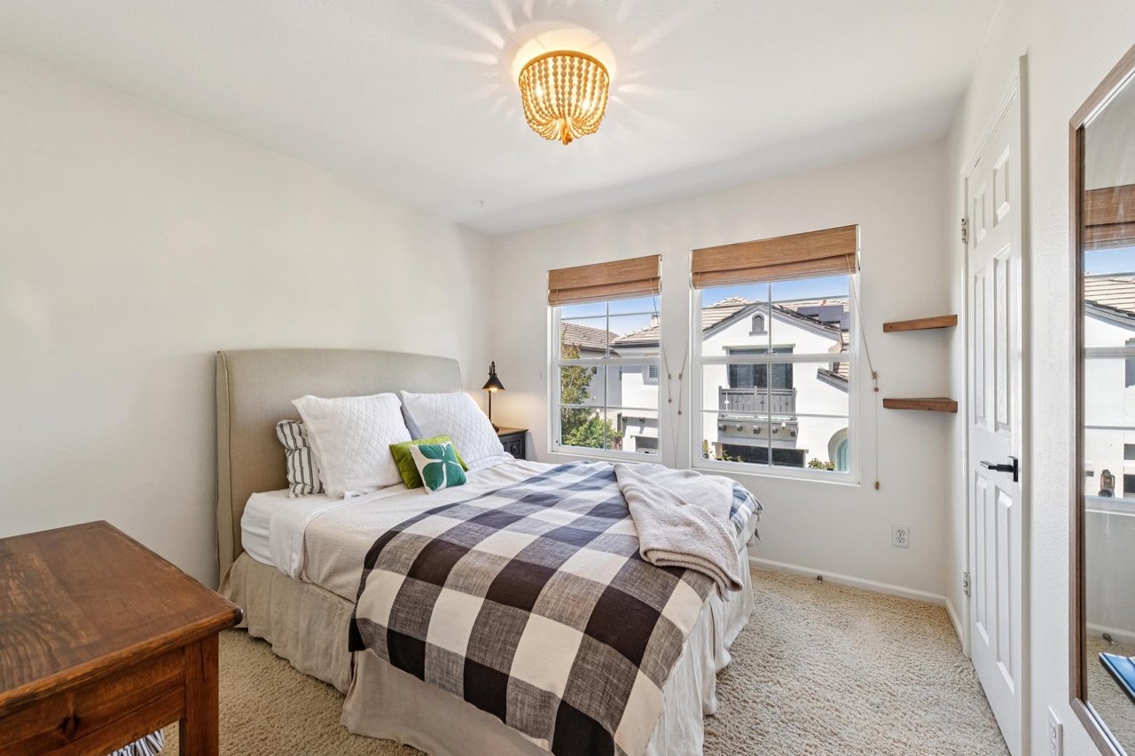 Well-appointed primary bedroom with refined finishes and serene views in Hamilton Marin.