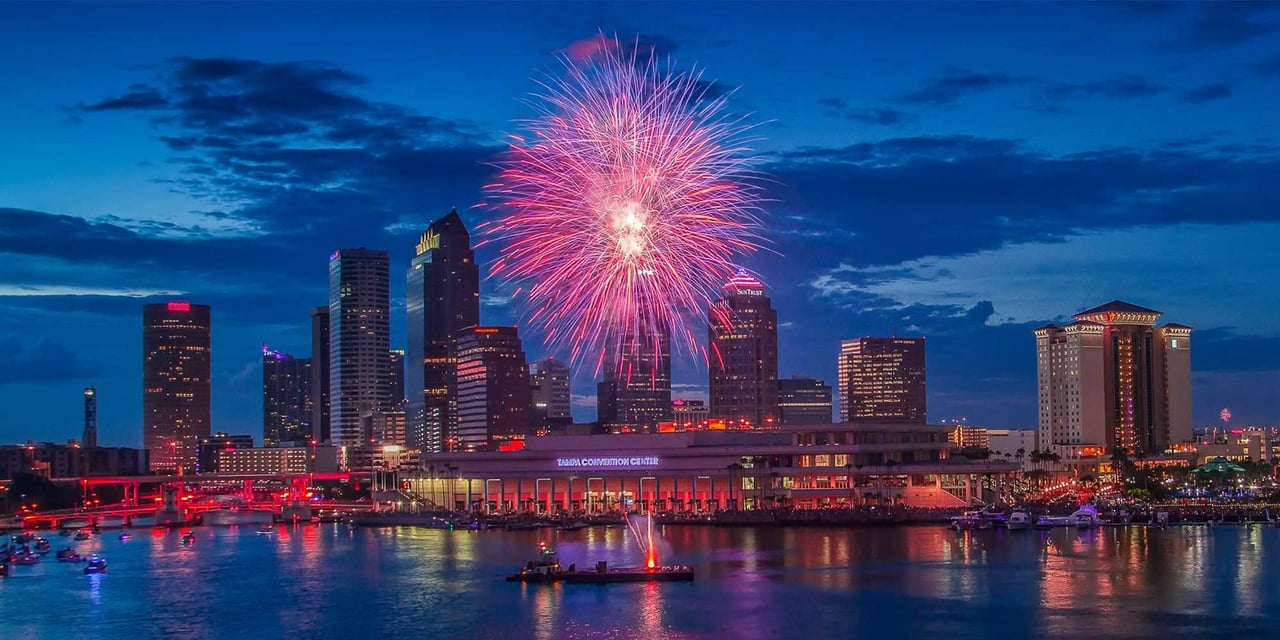 Fireworks lighting up the Tampa Riverwalk and downtown skyline during Fourth of July celebrations.