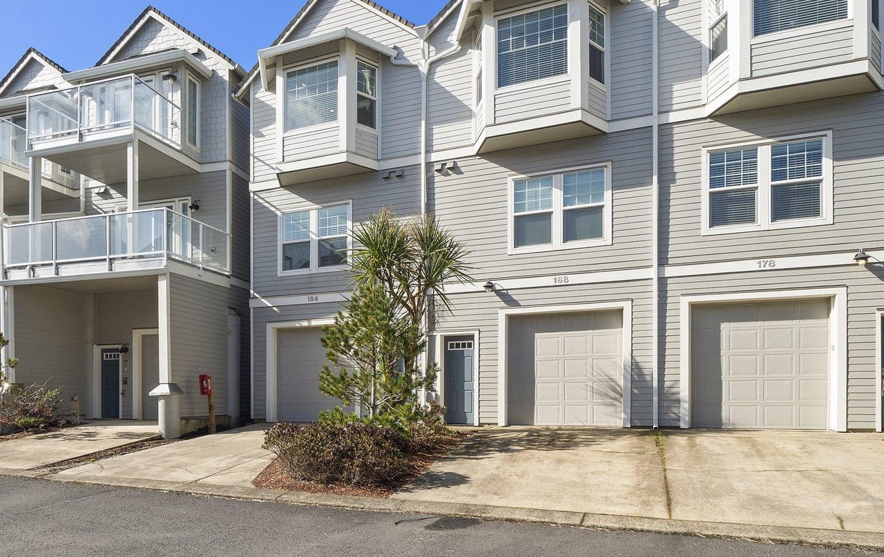 Sold Rockaway Beach townhouse at 164 North Pacific St represented by Home + Sea Realty, with three levels, garage parking, and a location near the ocean beach.