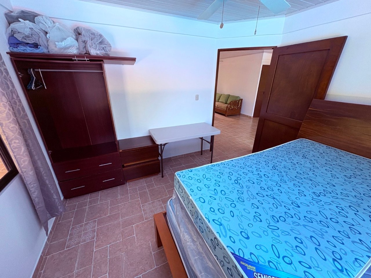 Move in ready 2 bedroom / 2 bathroom home with window ocean view and pool in Ojochal.