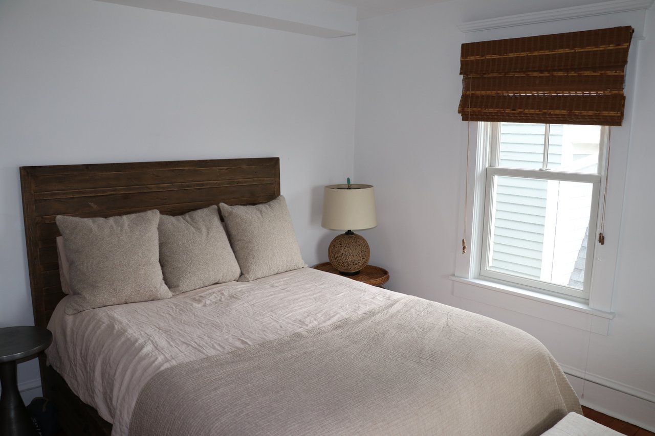 A Classic Bay Header with a Pool House