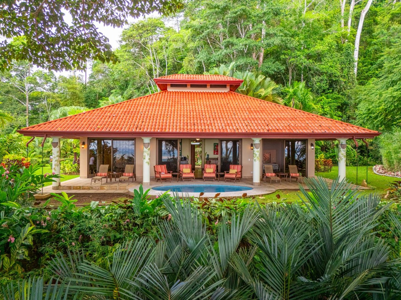 Ocean, jungle & mountain views on a meticulously landscaped 3-home family compound