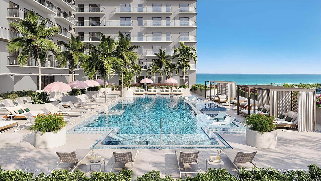 NoBe PARC pool deck with palm trees, cabanas, and ocean views.