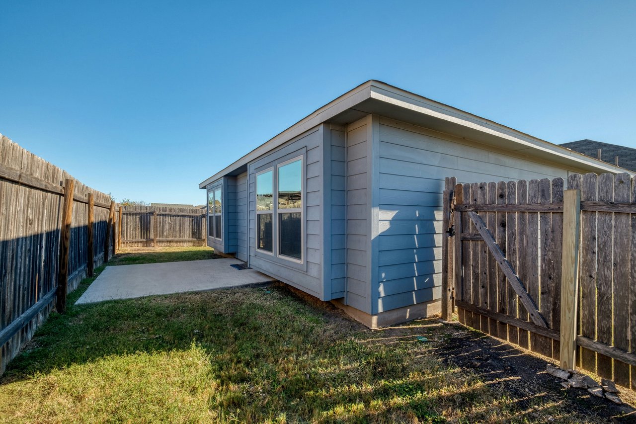 Rare Cul-de-Sac Gem in Manor – With No Neighbor on One Side and Access to HOA-owned Greenspace Right Outside Your Doorstep!