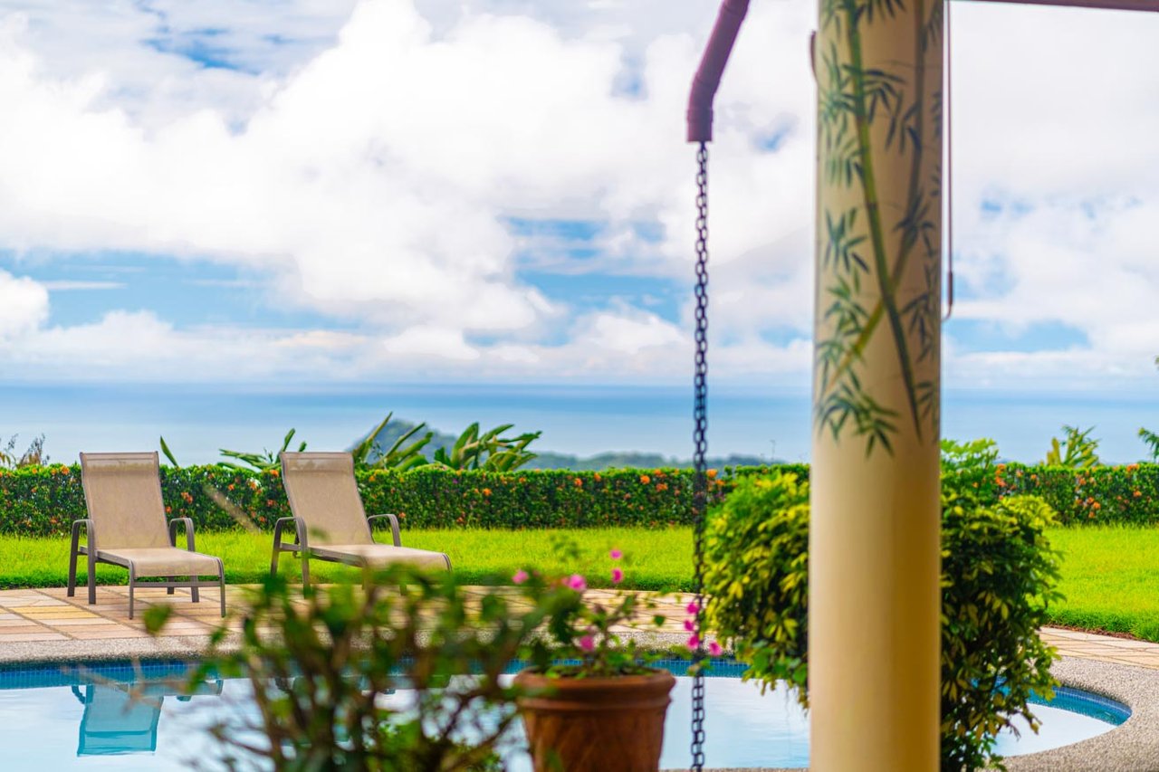 Ocean, jungle & mountain views on a meticulously landscaped 3-home family compound