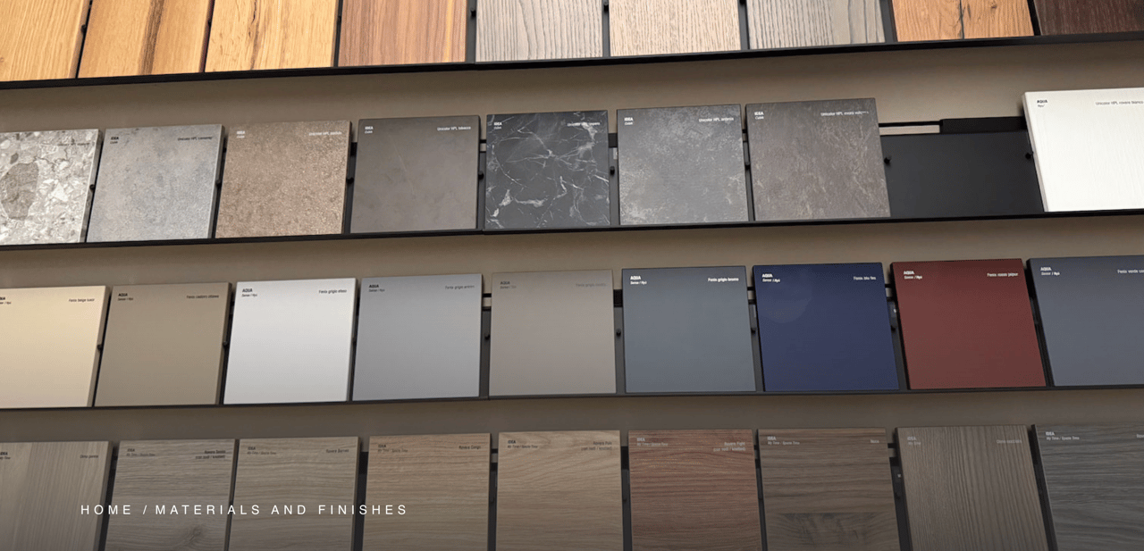 Home material and finish samples displayed on wall-mounted shelves.