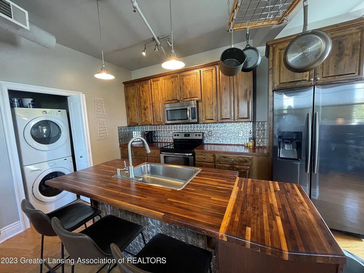 109 E Grand River Ave