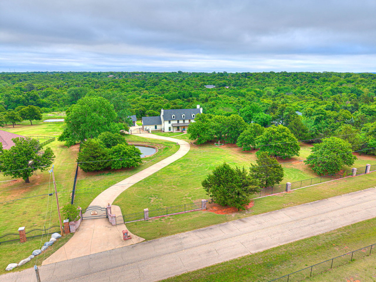LISTING OF THE WEEK • OKLAHOMA LUXURY  Five Acres. Four Bedrooms. Zero Compromises - 13500 Three Oaks Dr Jones, Oklahoma - Wyatt Poindexter - The Agency Oklahoma 