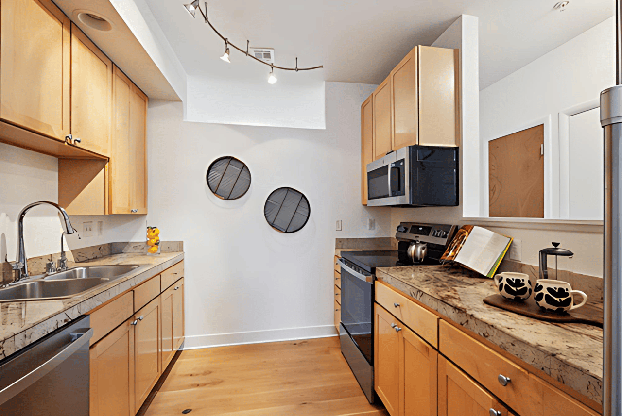 Just Listed: Soaring Vaulted Ceilings, 10’ Windows, and a Sleek Industrial Vibe Make a Striking First Impression in This Two-bedroom, Two-bathroom Fire Clay Loft!