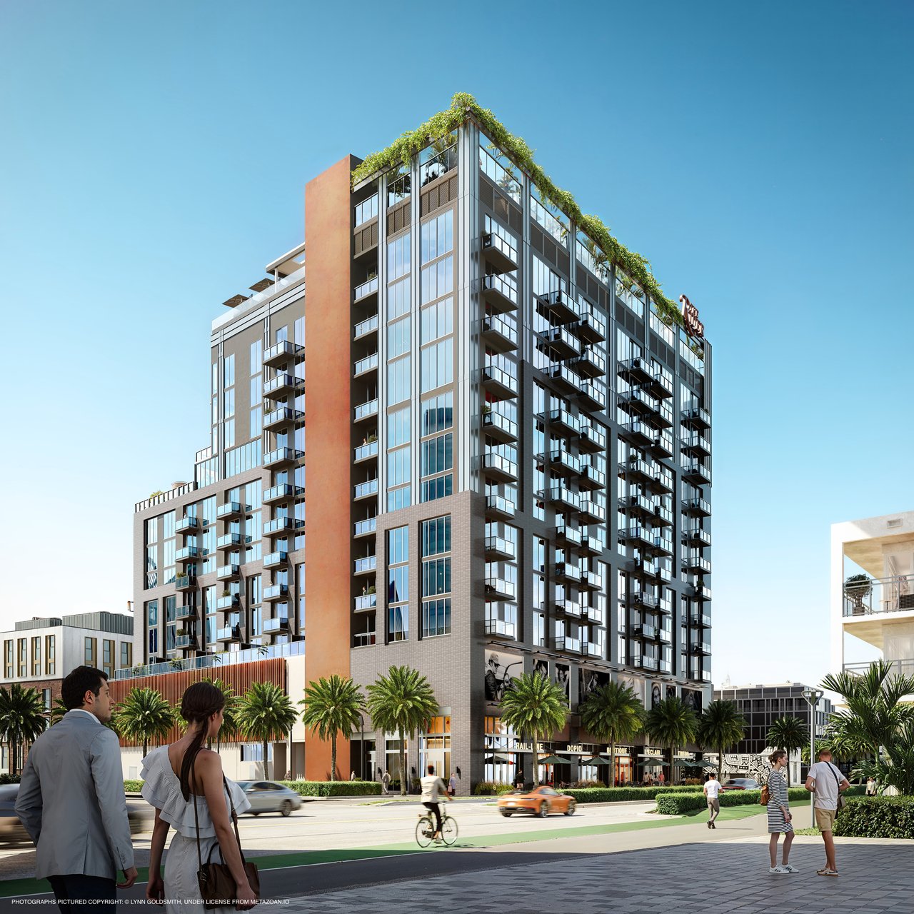 The Rider Residences, a glass-clad Miami tower with balconies and a landscaped rooftop.
