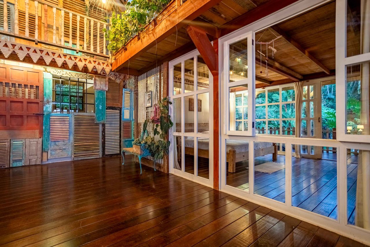 A Handcrafted Residence Immersed in Nature Above the Canopy Ocean View Architectural Home