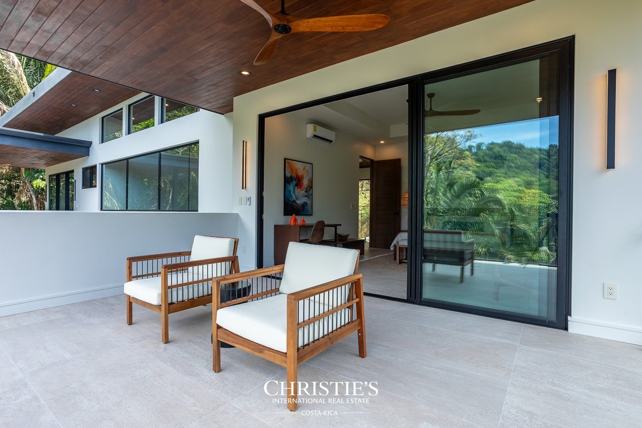 Modern Tropical Ocean & Mountain View Home