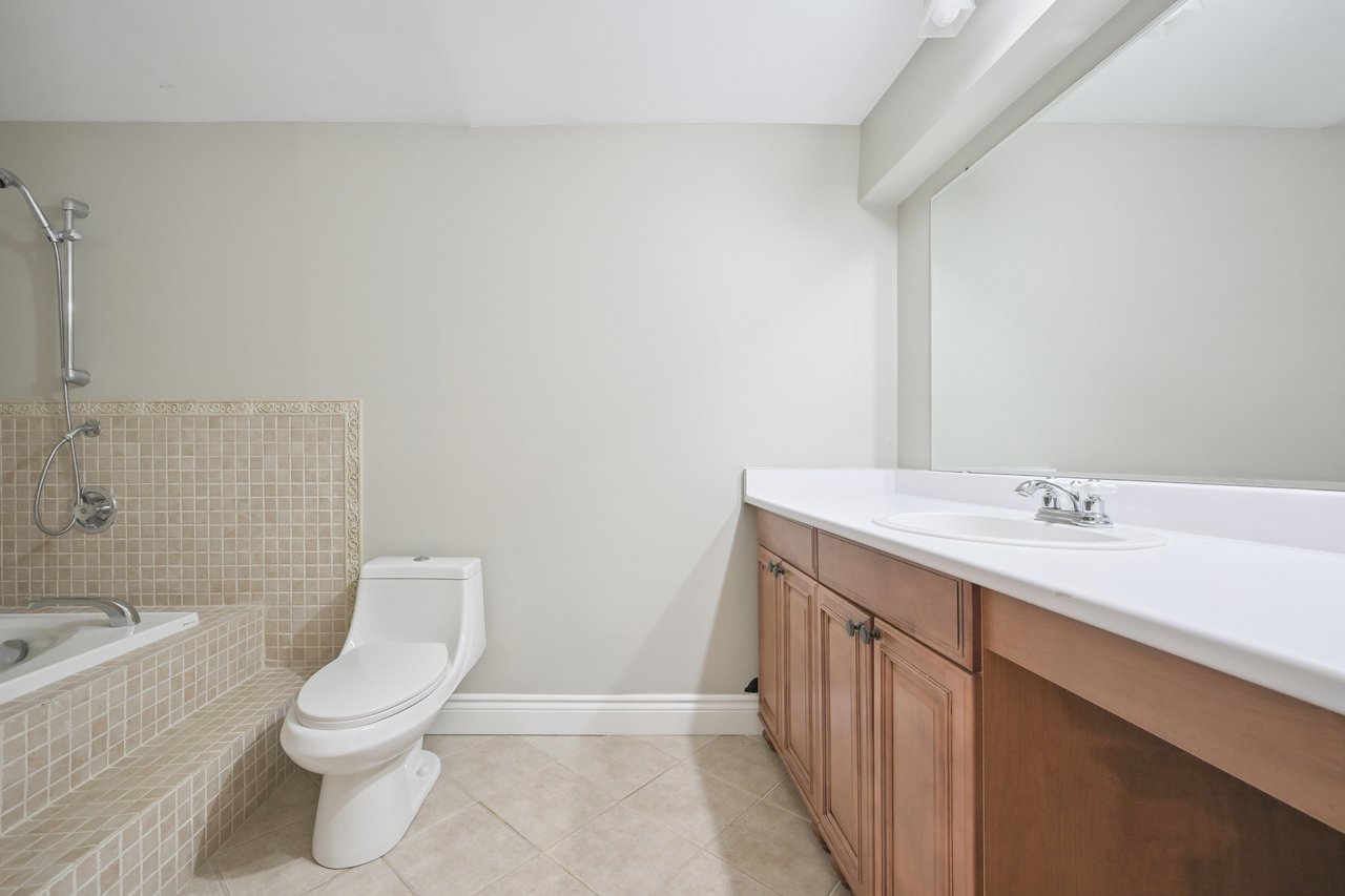 Prestigious Glen Abbey living with a backyard made for summer