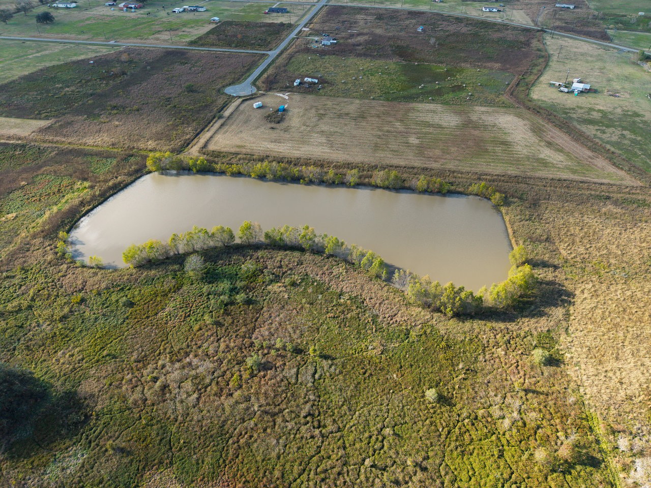 20 Acres of Land for Sale with Pond | Boling, TX | Aqua Terra Real Estate