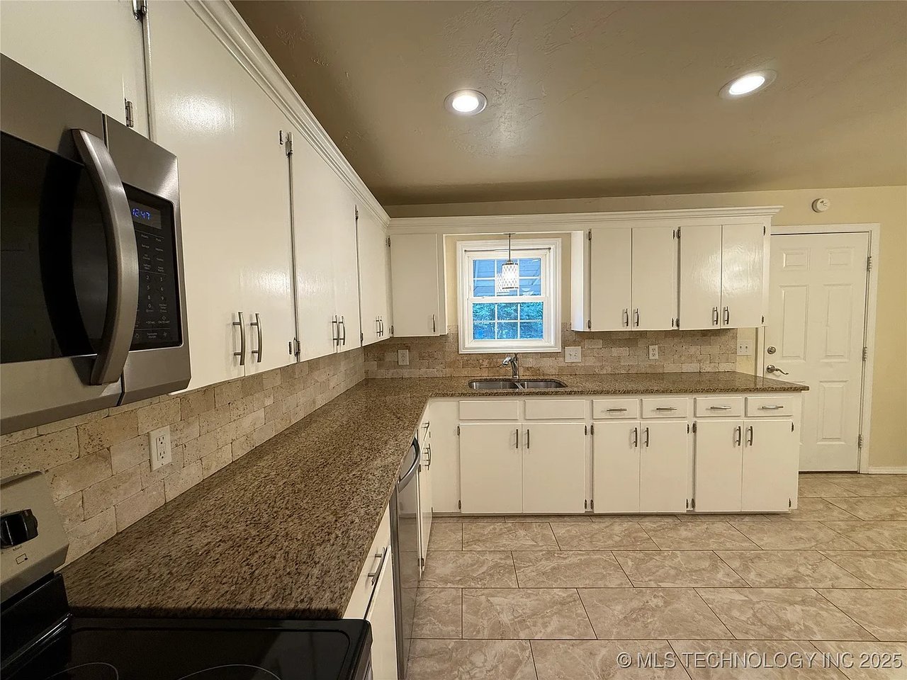 116 SW 5th St